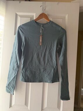SKIMS Long Sleeve Crewneck Top in Dusty Blue-Green